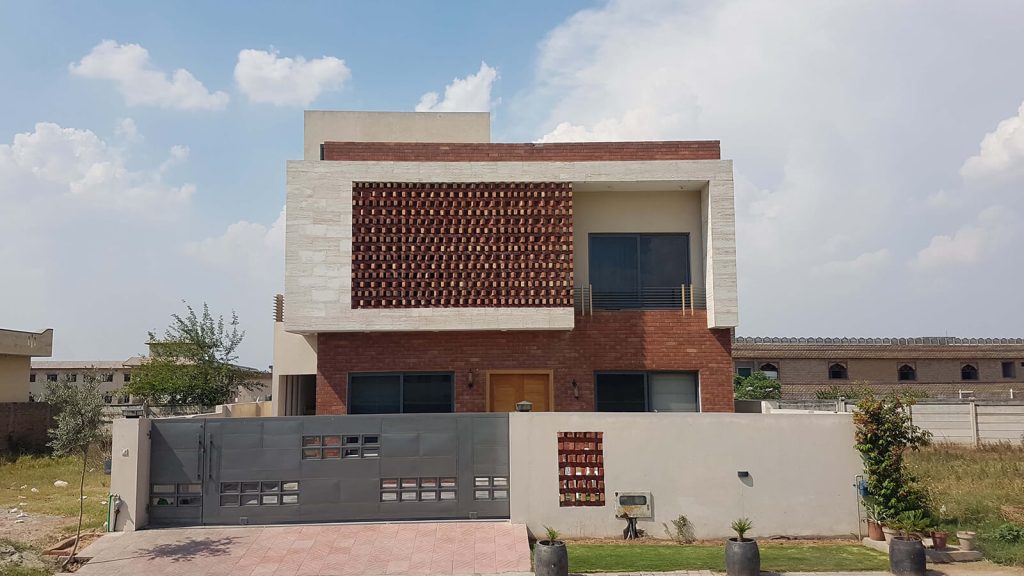 10 Marla Modern House design in Bricks and Marble stone in DHA Phase II, Islamabad