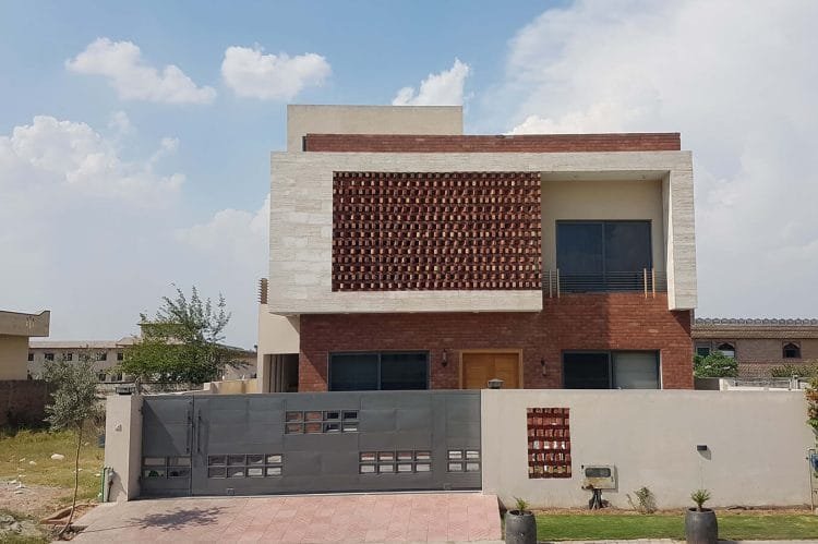 10 Marla Modern House design in Bricks and Marble stone in DHA Phase II, Islamabad