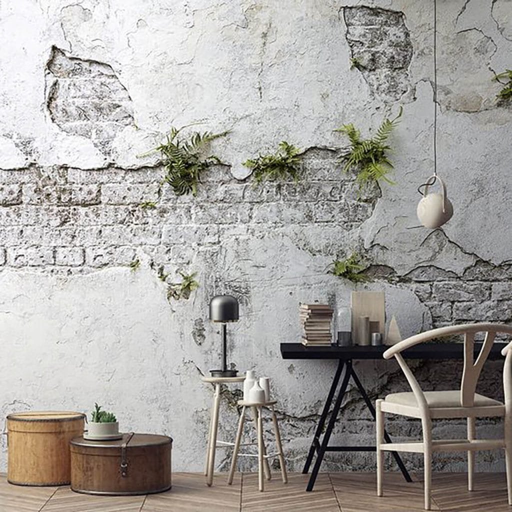 Broken and exposed wall giving character in industrial boho style