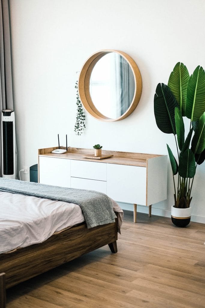 Mirror in the living room with muted tones and earthy palette in boho style