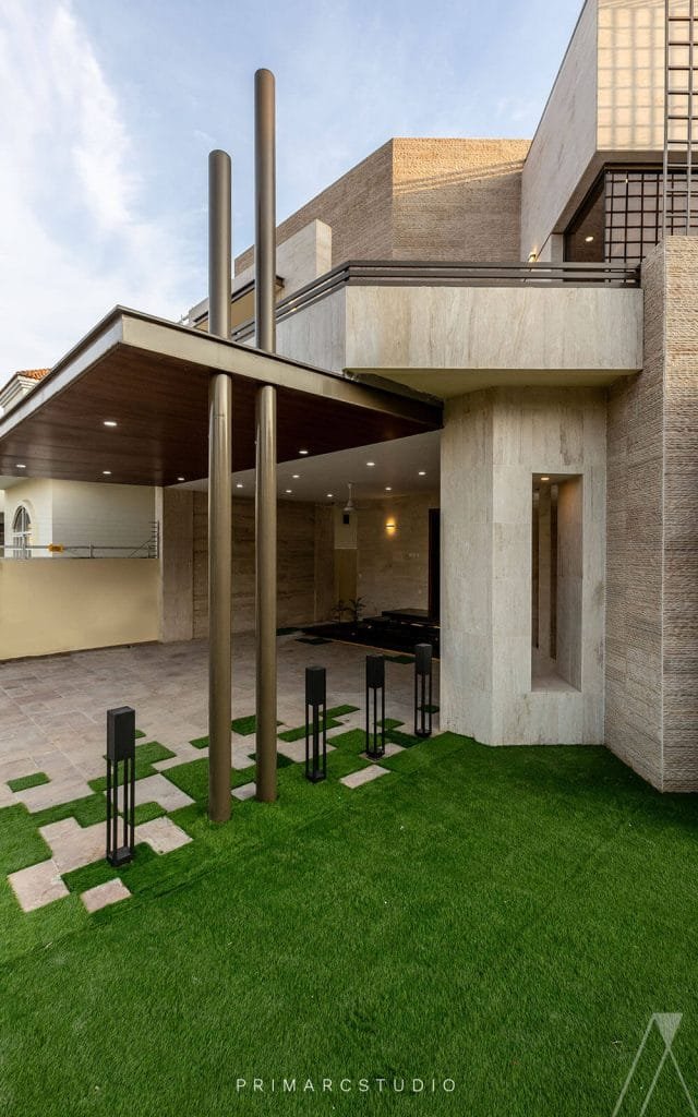 View of garage from front lawn with garden lights from Just Another Guild