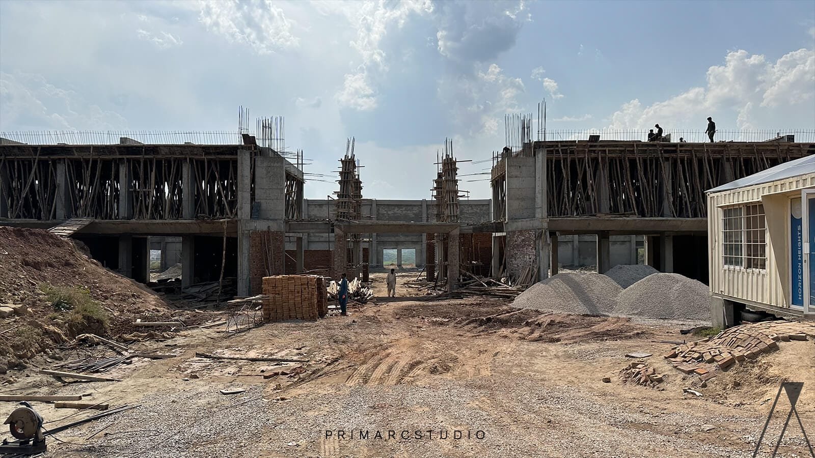 Grey structure of marquee under construction in Islamabad on Expressway