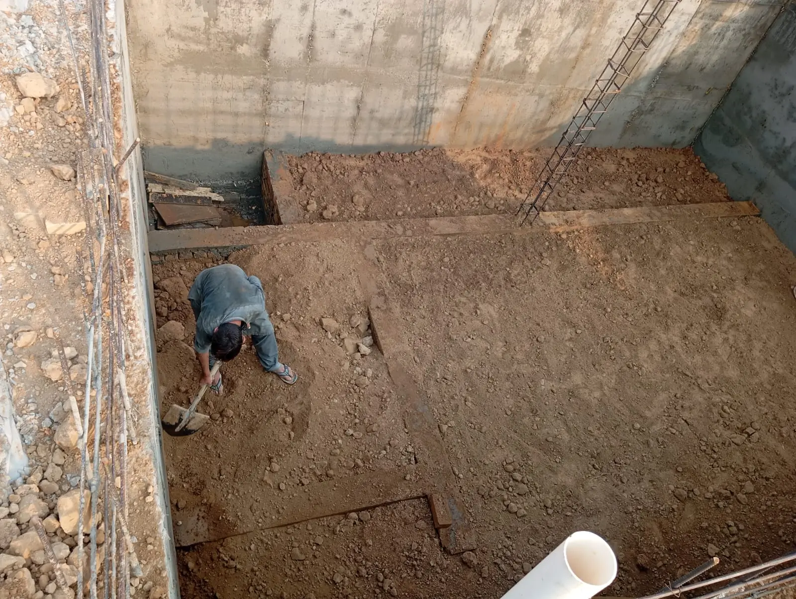 Worker working in the basement of 5 marla house in Rawalpindi