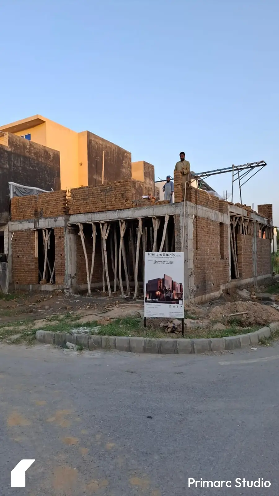 7 Marla house design under construction in Islamabad and banner of Architect outside the house