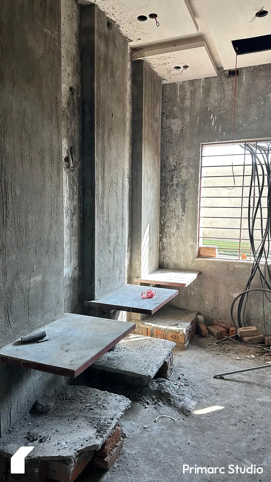 View of the washroom stalls in a modern marquee designed by the architects of Primarc Studio. The interior features sleek over-the-counter sinks, showcasing a contemporary and functional design aesthetic.