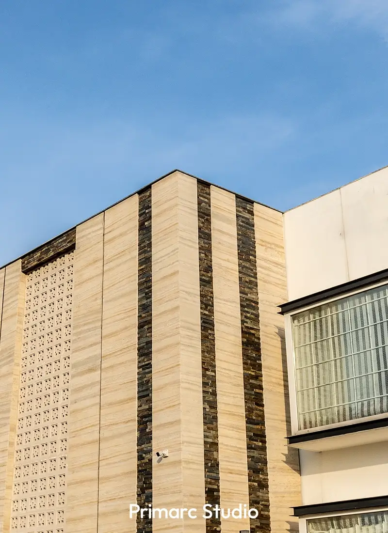 Vertical shot of a modern farm house exterior in Gulberg Greens, Islamabad, emphasizing the unique facade treatment by Primarc Studio. This image illustrates the contemporary design approach taken for farm houses in Islamabad, highlighting Primarc Studio's expertise in exterior and facade design.