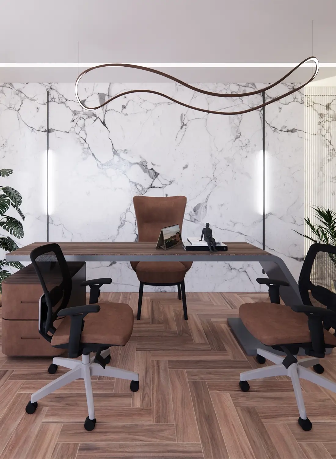 A contemporary executive office features a large desk with a unique curved metal base and wooden top. Behind it, a striking wall is clad in a grey and white marble pattern, accented by vertical LED light strips on either side. A single high-backed brown leather chair is positioned behind the desk, with two matching standard office chairs in front. Overhead, a distinctive wavy suspended light fixture illuminates the space. The floor is finished with a warm-toned wooden parquet laid in a herringbone pattern. Potted plants add a touch of greenery to the corners, enhancing the professional and modern aesthetic suitable for a software company in Top City, Rawalpindi.
