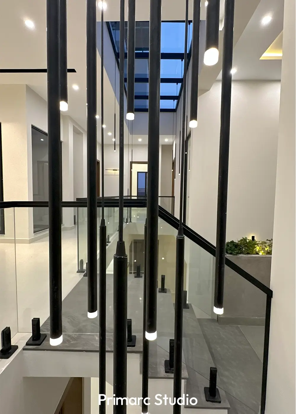 Close-up of vertical pendant lighting in contemporary 10 marla house Gulberg Residencia Islamabad.