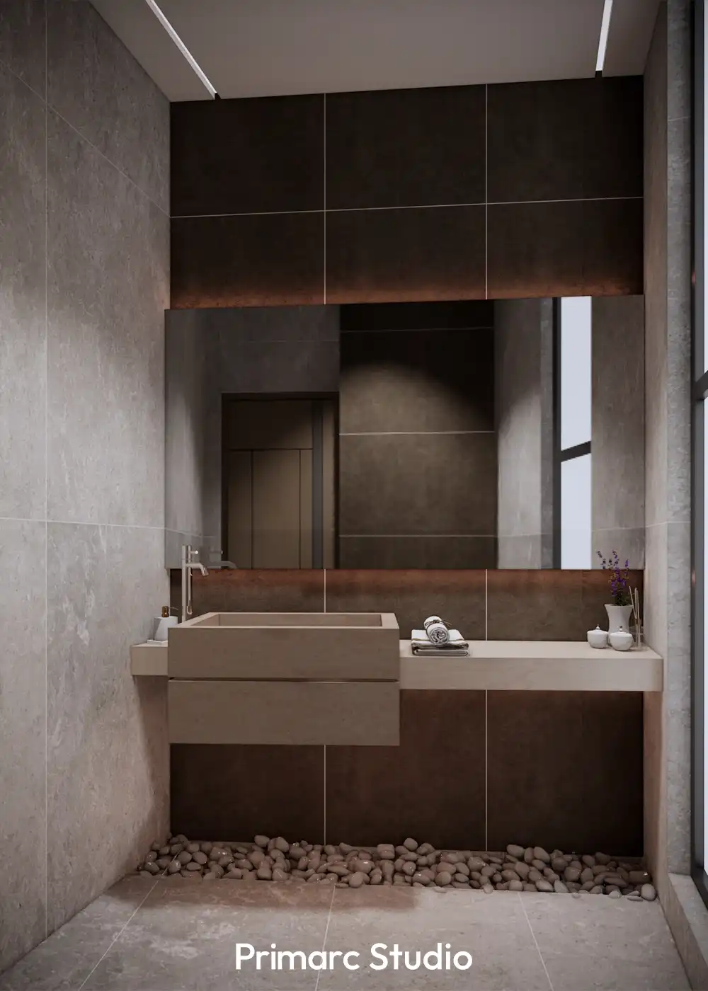 Sophisticated powder room at Shaukat House with a stone vessel sink, dark textured wall tiles, and a river-stone floor feature under the vanity.